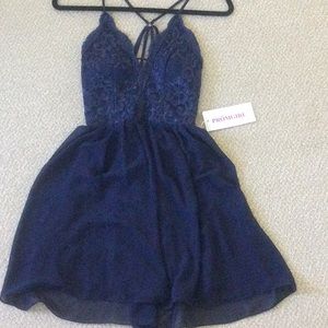 Prom dress in navy blue, with tags